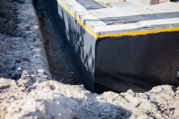 Professional Waterproofing technician working in Bryan, OH